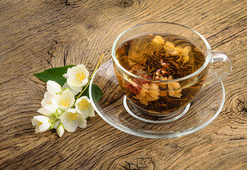 Cup of jasmine tea with flowers