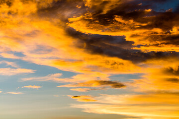colorful dramatic sky with cloud at sunset