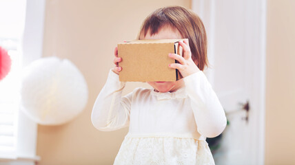 Toddler girl using a virtual reality headset