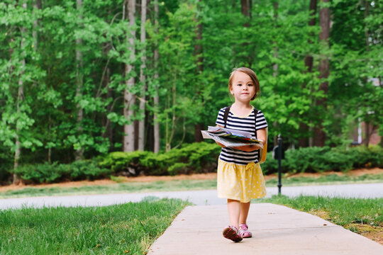 Happy Toddler Girl Arriving Home From School