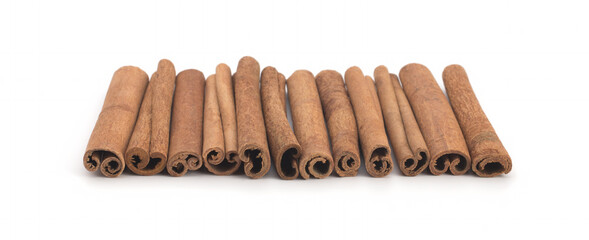 Cinnamon sticks on white background