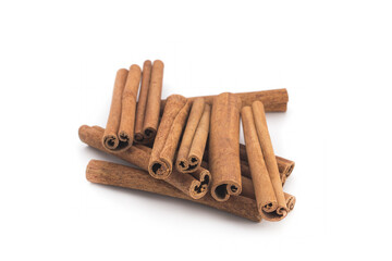 Cinnamon sticks tied with a jute rope on a white background