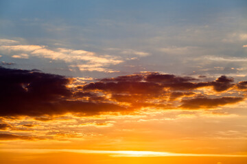 colorful dramatic sky with cloud at sunset