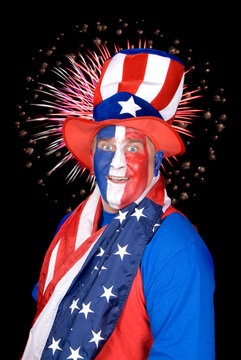 Patriotic man and fireworks