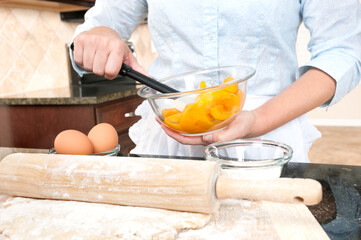 Woman mixing pie filling