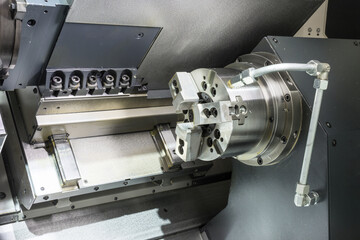 Modern lathe metalworking CNC machine.