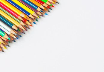 Colored pencils on a white background.