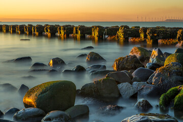 Beautiful sunrise light on the beach stones