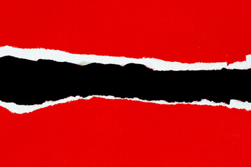 torn paper on black. copy space