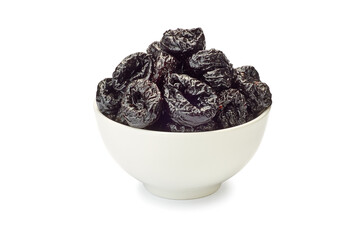 Bowl of dried plums on white