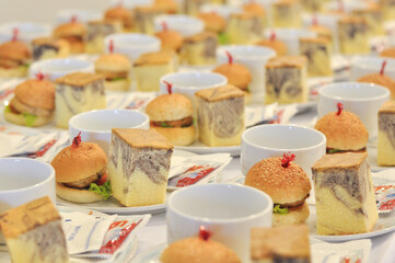 Hamburgers and piece of marble cakes for meal after break of meeting, Bangkok Thailand