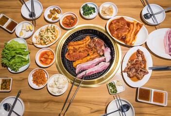Korean BBQ Raw Beef, pork and Vegetables on the wooden table