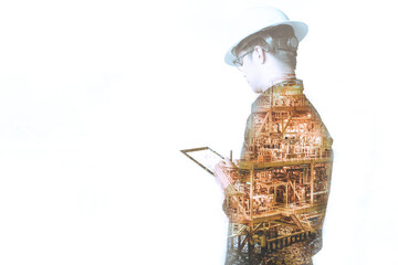 Double exposure of Engineer or Technician man with safety helmet operated platform or plant by using tablet with offshore oil and gas platform background for oil and gas business