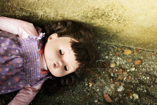 Andoned Person,Abandoned doll laying on Dirty floor,vintage tone