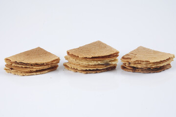 Kuih Kapit or the Love Letter biscuit over white background