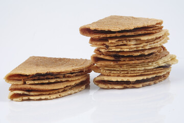 Kuih Kapit or the Love Letter biscuit over white background
