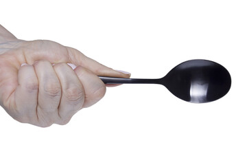 Female hand with a spoon