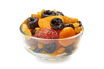 Glass bowl of dried fruits mix on white