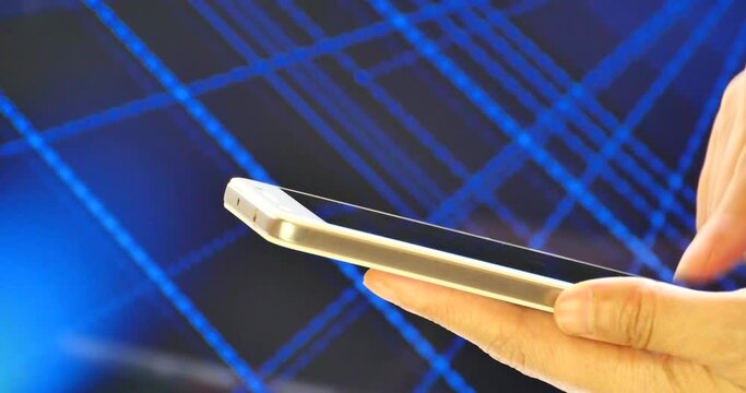 4k browsing on smartphone with blue tech background.