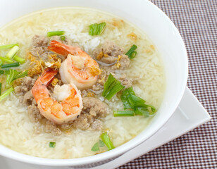 Rice soup bowl with shrimp and pork