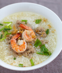 Rice soup bowl with shrimp and pork