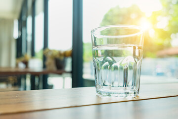 Glass of Water on Wood Table