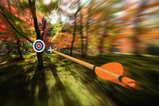 Arrow moving with precision and blurred motion toward an archery target, part photo, part 3D rendering