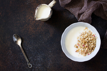 Healthy breakfast. Homemade yogurt with granola. Top view with copy space.