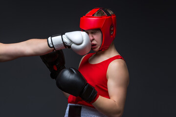 young boxer is being punched