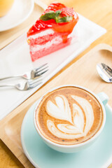 coffee heart cup on wood table in coffe shop cafe