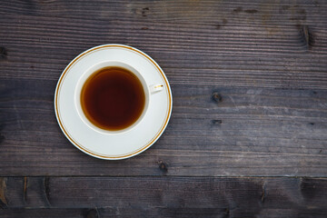 A cup of tea on a wood background