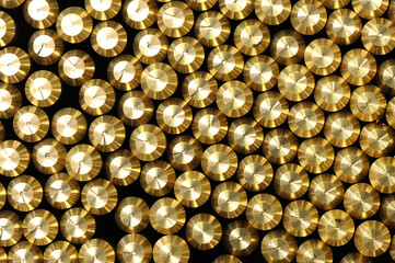 Background pattern of bevelled brass rods