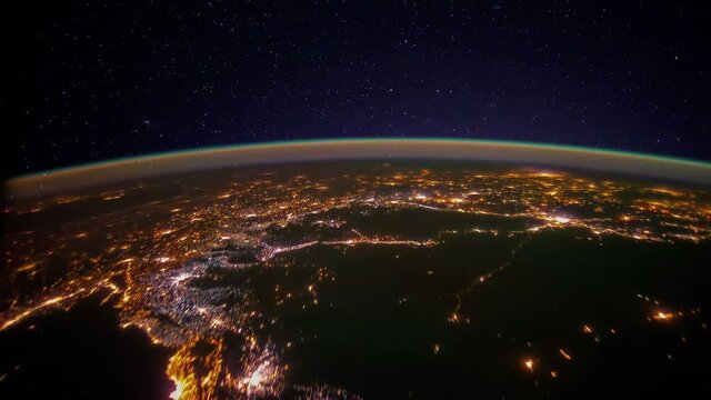 City Lights over Middle East. Pass from northwest Sudan to the Caspian Sea. Visible are northern Africa, Nile River Delta region, Cairo, Arabian Peninsula, cities of Beirut and Tel Aviv, Baghdad.