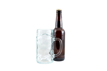 Bottle of beer with empty goblet for beer isolated on white.