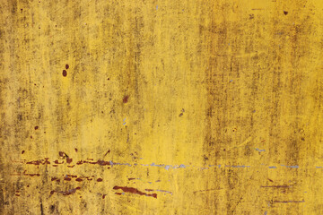 The flaking yellow color with scratched on the surface of rusty galvanized iron plate may be used as background