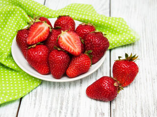 ripe strawberries on wooden table