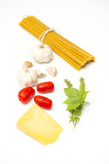 Raw spaghetti with fresh ingredients