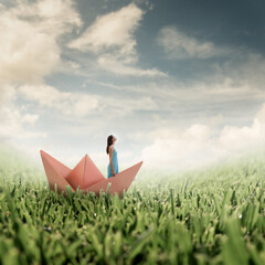 Photo manipulation combining several elements and including a copyspace in the cloudy sky