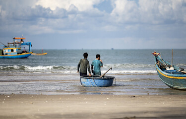 Fisherman and basket boat