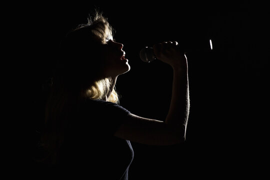 woman with a microphone in her hands