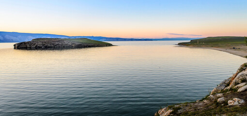 Beautiful down on lake Baikal in summer morning