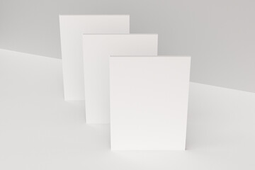 Three blank white closed brochure mock-up on white background