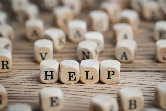 Cubes with word "HELP" surrounded by many other cubes