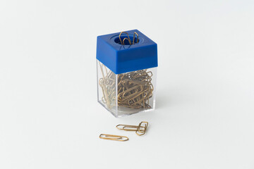 Box with office clips / Box with office paper clips isolated on white