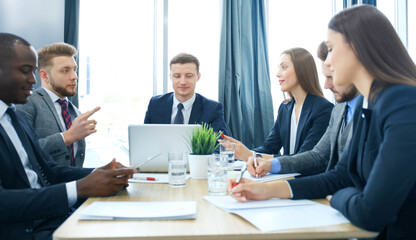 Group business people working together and brainstorming.