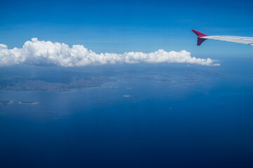 Obraz na płótnie Canvas View from a jet plane window over Lombok island, Indonesia