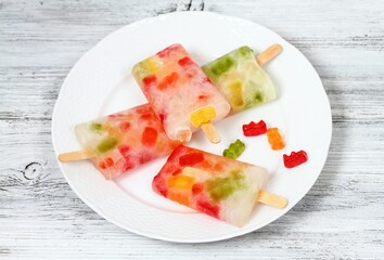 Homemade ice lolly from gummy bears