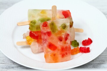 Homemade ice lolly from gummy bears