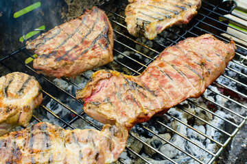 Baked beef and pork meat on grill