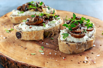Garlic mushroom toast with creamy herbed ricotta chees spread